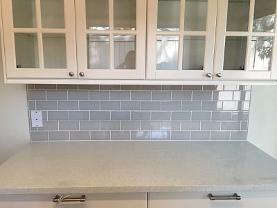 grey subway tile backsplash